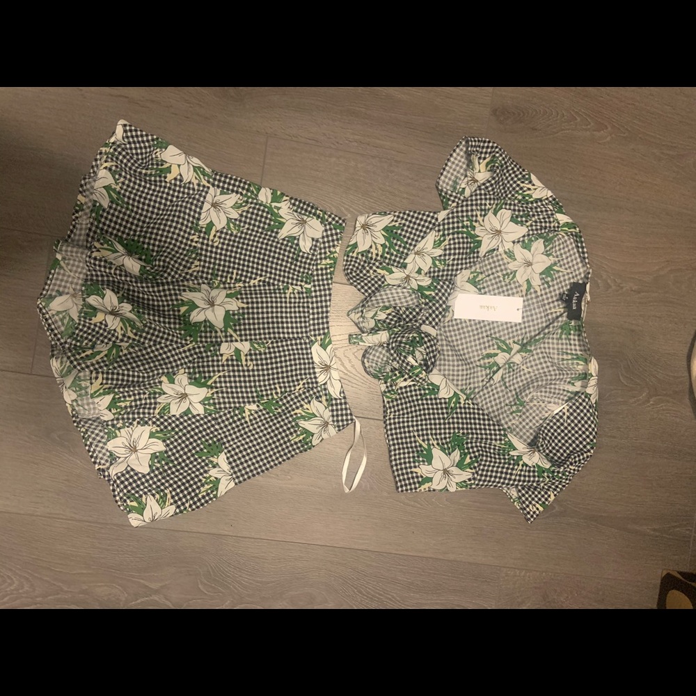 Two piece set. Wrap top and short bottoms.